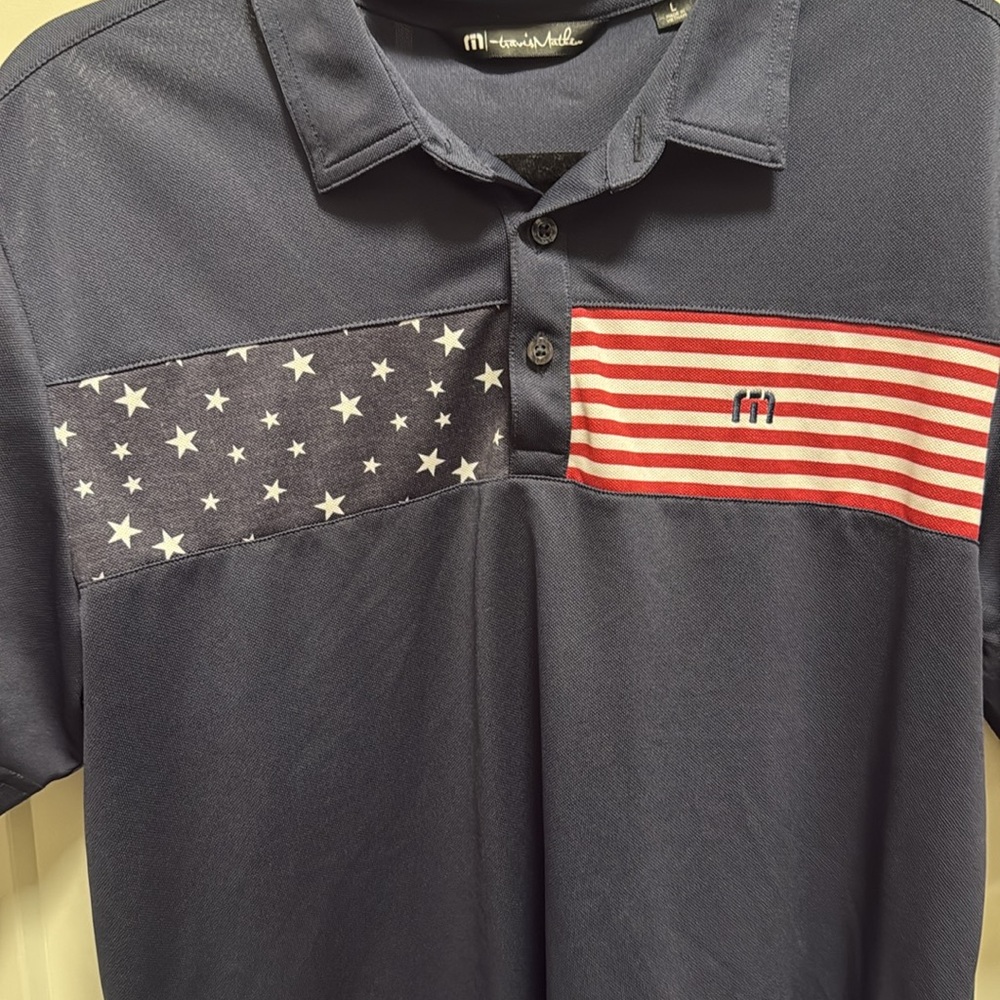 Travis Mathew Men's Navy Polo Shirt with American Flag Panel - Picture 2 of 3